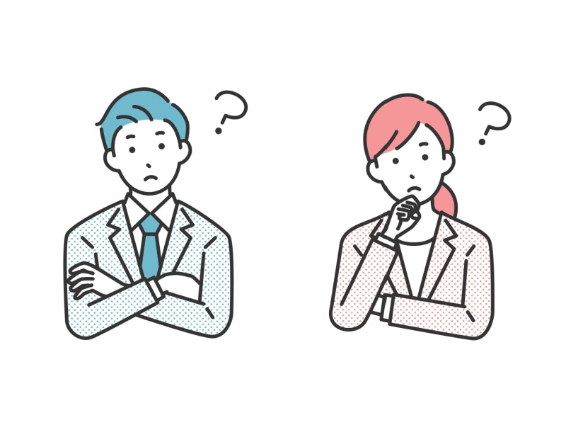 男女のビジネスマンがポーズを決めて。